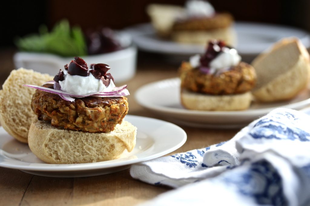 A bean burger with a Mediterranean twist! Check out these easy and delicious Mediterranean Veggie Burgers! @cookinRD | sarahaasrdn.com