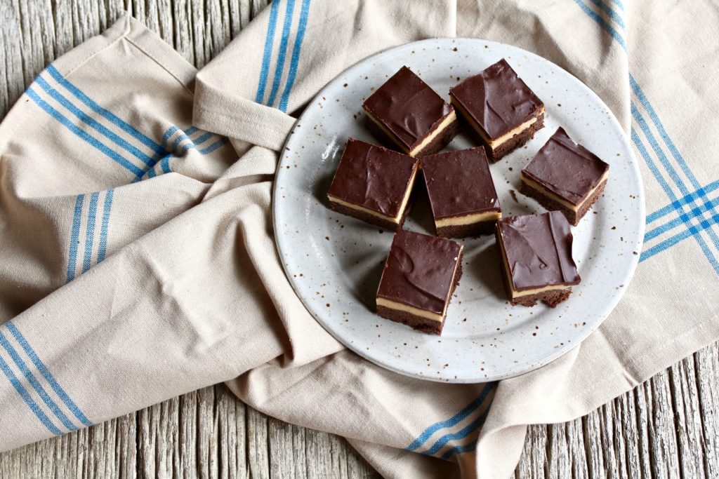 Have you ever had a buckeye brownie? If not, I'm about to change your world! Chocolate meets peanut butter in an oh so yummy way! Get the recipe now! @cookinRD | sarahaasrdn.com