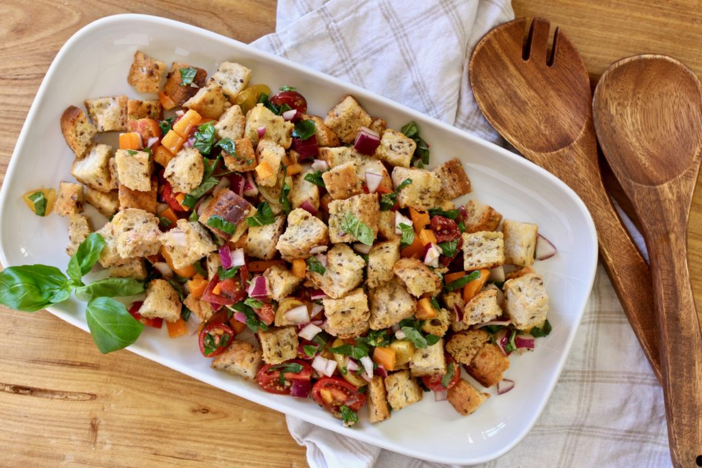 Panzanella, a delightful bread salad made with chewy whole grain baguette tossed with fresh tomatoes, basil and a simple vinaigrette. @cookinRD | sarahaasrdn.com