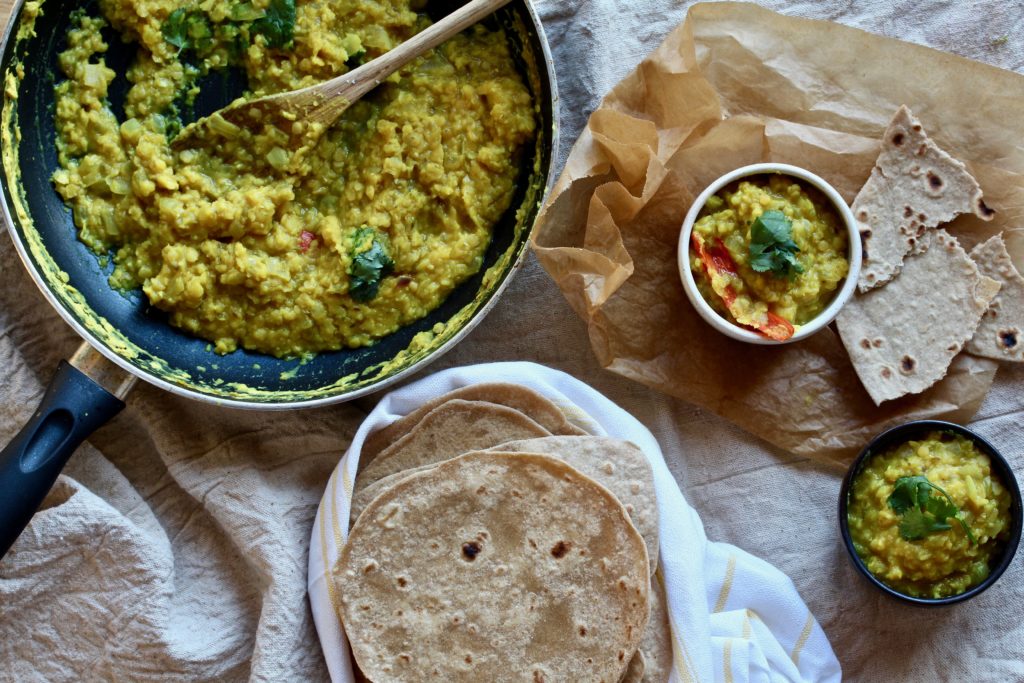 Looking for a super delicious, vegetarian dish that satisfies? Look no further than this Red Lentil Dal! @cookinRD | sarahaasrdn.com