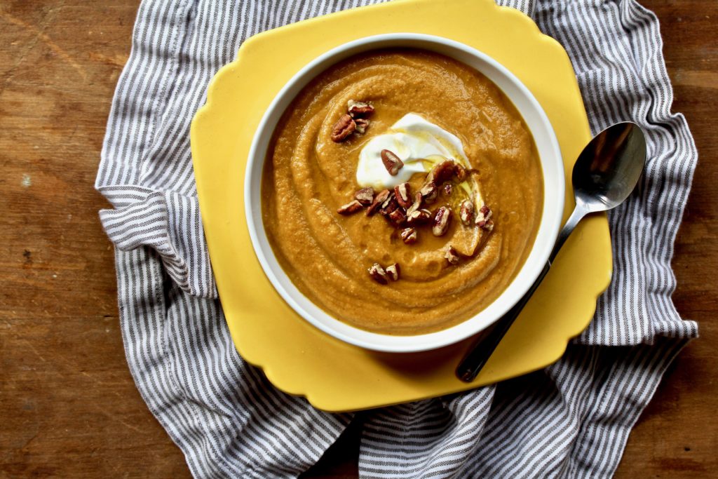 Pumpkin spice isn’t just for sweet dishes! You’ll love this blend of spices when cooked with red lentils, yummy aromatics and pumpkin to make this Pumpkin Spice Lentil Soup! @cookinRD | sarahaasrdn.com